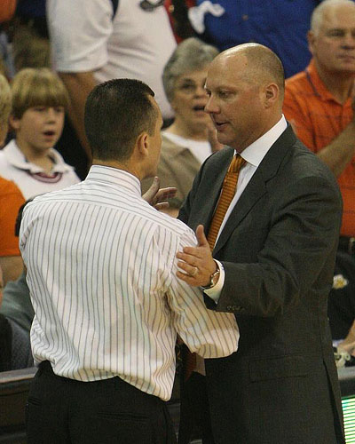 Auburn basketball coach jeff lebo greets florida's billy donovan before the game